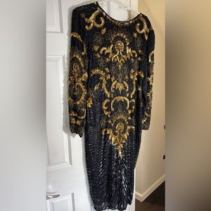 Stunning black and gold beaded dress perfect for holiday parties!